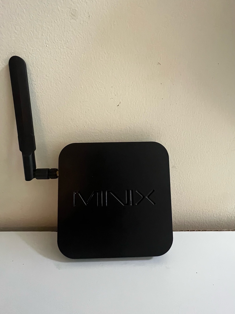 Black Networking Device with External Antenna - Compact Wireless Hub
